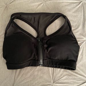 Black zip up sports bra